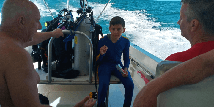 Boy and Grandpa Getting Ready to Dive from the Narcosis 720x360